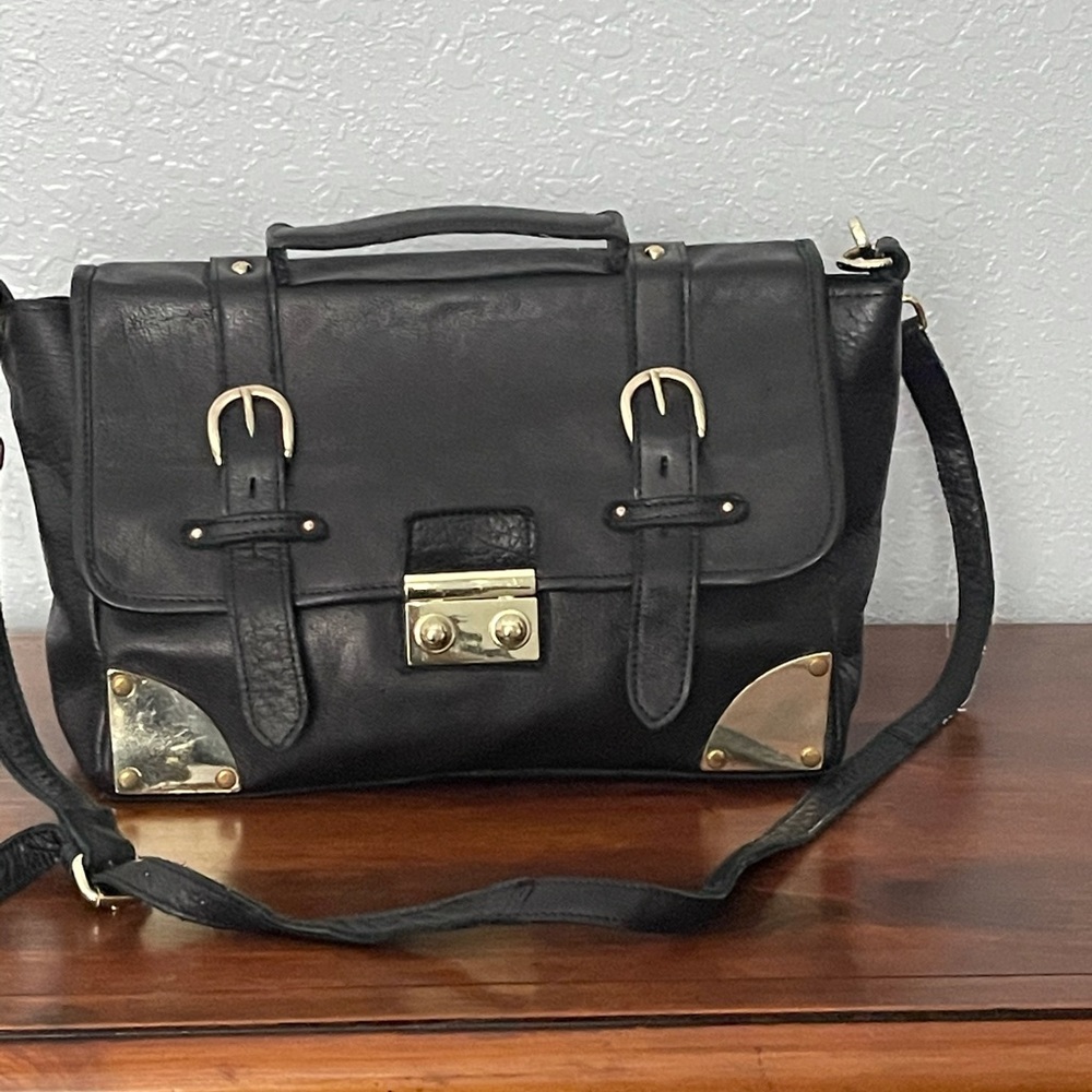 Black oiled leather pocket book. Used. Beautiful .
